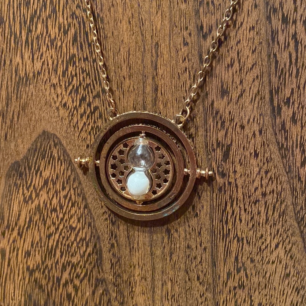 Unique hourglass spinner necklace brass color toggle clasp